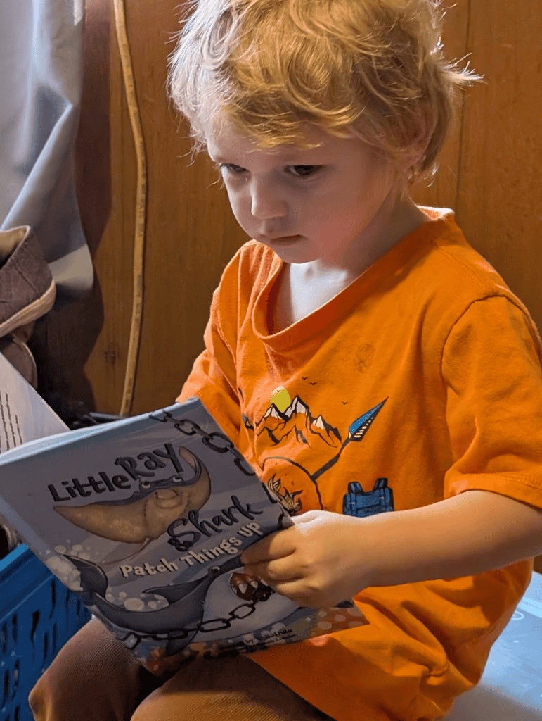 Two-and-a-half-year-old Matthew captures hearts with Shark.
