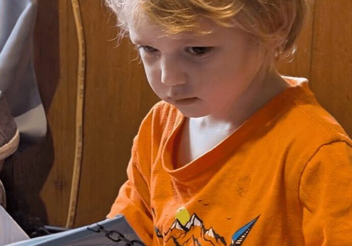 Two-and-a-half-year-old Matthew captures hearts with Shark.